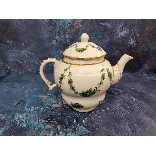 372 - A Bristol moulded ogee shaped teapot and cover,  painted with garlands of green roses and scattered ... 