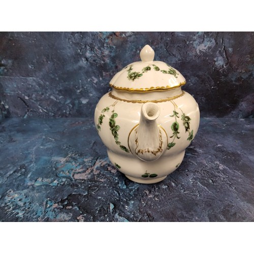 372 - A Bristol moulded ogee shaped teapot and cover,  painted with garlands of green roses and scattered ... 