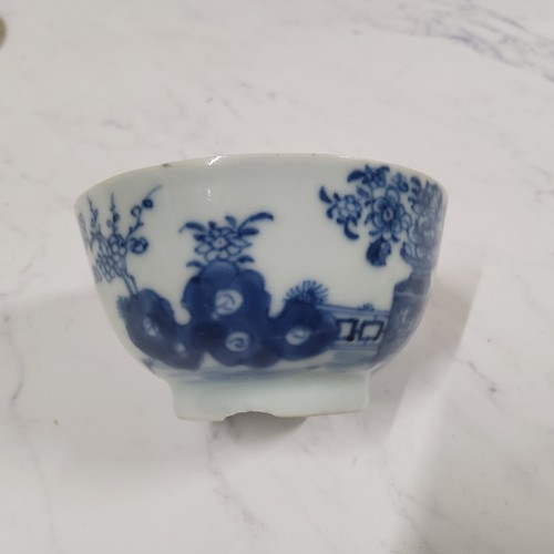 402 - A Chinese Bat pattern tea bowl and saucer, decorated with bat, vase of flowers and fence, 12cm diam,... 