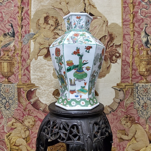 411 - A Chinese famille verte hexagonal vase,  the hexagonal baluster form, decorated with panels of antiq... 