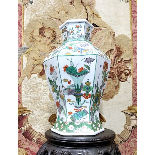 411 - A Chinese famille verte hexagonal vase,  the hexagonal baluster form, decorated with panels of antiq... 