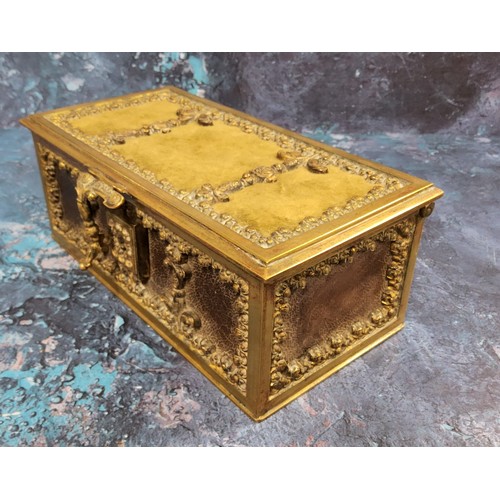 433 - A French gilt metal and leather rectangular casket, cast in relief with flowerheads and scrolls, 7.5... 