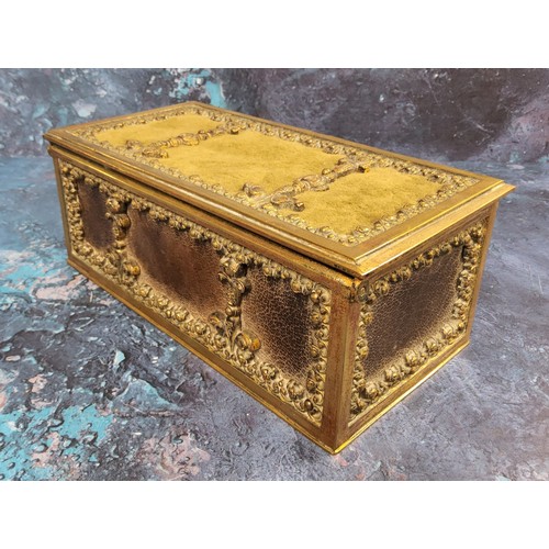 433 - A French gilt metal and leather rectangular casket, cast in relief with flowerheads and scrolls, 7.5... 