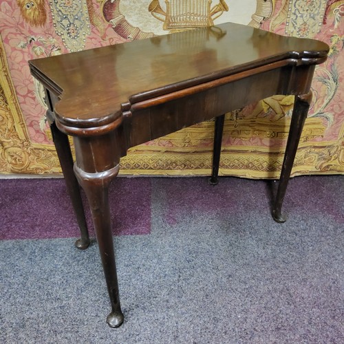 456 - A George II 'red walnut' card table,  folding top enclosing an inset baize lined playing surface, co... 