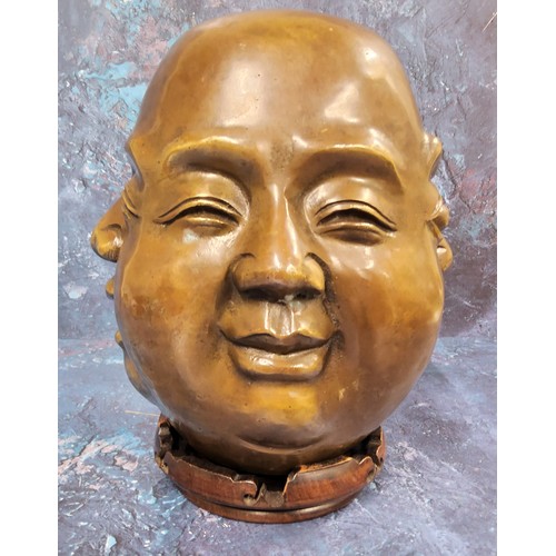 484 - Chinese School, a brown patinated bronze, The Four Faces of Buddha, 24cm high, hardwood stand