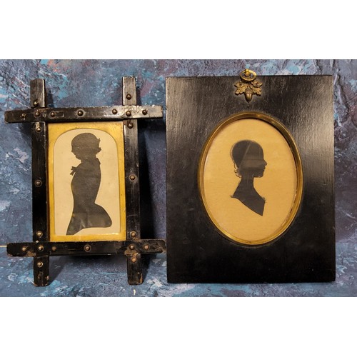 488 - A Victorian cut-card silhouette, of a lady, head and shoulders, oval, 10cm x 7.5cm, ebonised frame; ... 