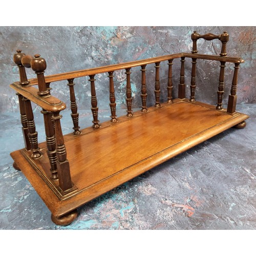 508 - A George IV mahogany book carrier, turned spindles, rectangular base, bun feet, 41cm wide, c.1825