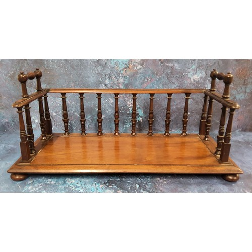 508 - A George IV mahogany book carrier, turned spindles, rectangular base, bun feet, 41cm wide, c.1825