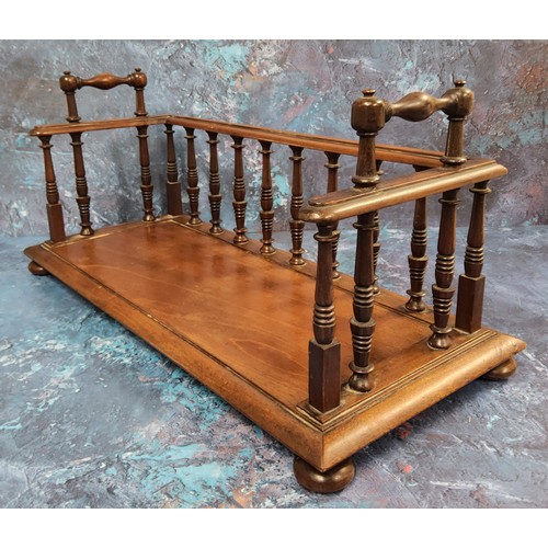 508 - A George IV mahogany book carrier, turned spindles, rectangular base, bun feet, 41cm wide, c.1825