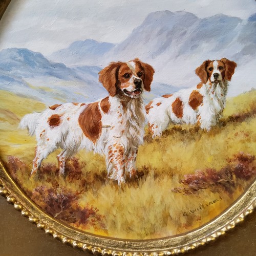 540 - Glynn Williams, Two Springer Spaniels, signed, circular, oil on board, 14.5cm diam