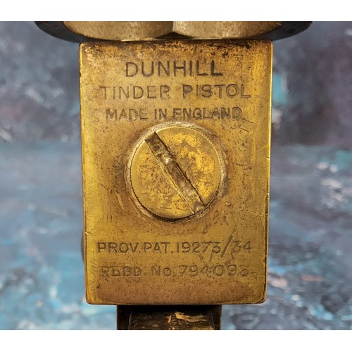 571 - A Dunhill flintlock 'Tinder pistol' lighter, stamped 'Dunhill tinder pistol, made in England, PAT. 1... 