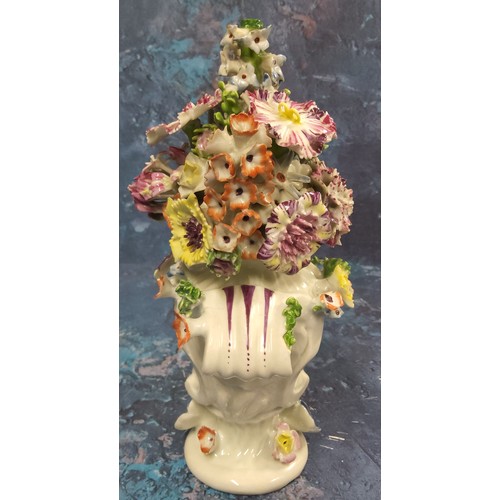 384 - A Longton Hall vase and cover, of asymmetric shape encrusted with flowers, painted with rose and flo... 