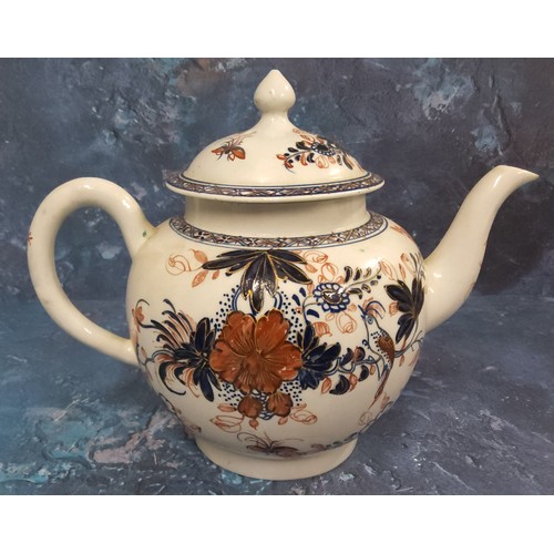 385 - A Liverpool  globular Bird on a Branch pattern  teapot and cover,  painted in underglazed blue paint... 