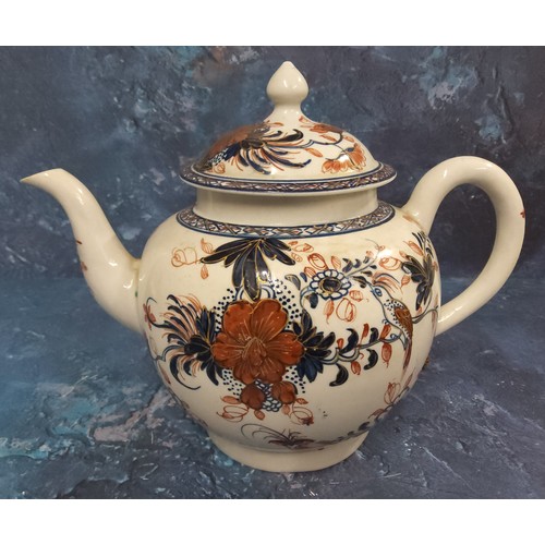 385 - A Liverpool  globular Bird on a Branch pattern  teapot and cover,  painted in underglazed blue paint... 