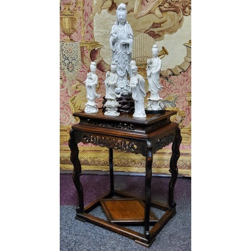 412 - A Chinese padouk wood rectangular jardiniere stand, pierced and carved stepped apron with central ch... 