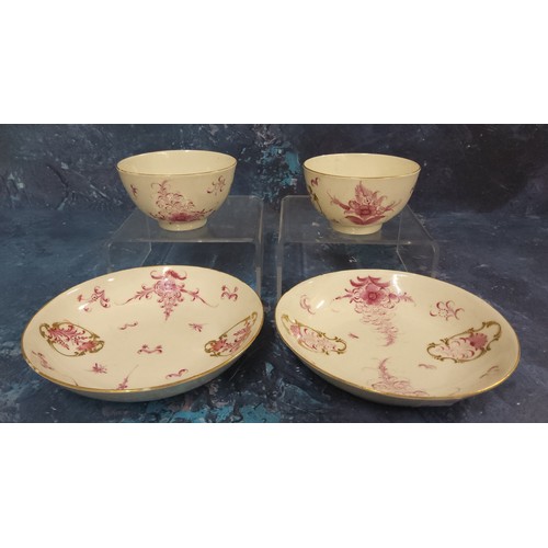 341 - A pair of Worcester  tea bowls and saucers,  painted in Meissen style with puce camaieu flowers, in ... 