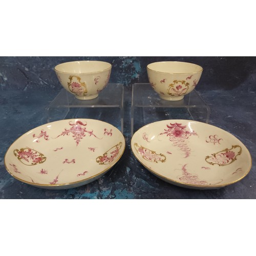 341 - A pair of Worcester  tea bowls and saucers,  painted in Meissen style with puce camaieu flowers, in ... 