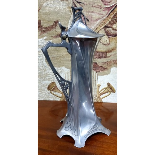 468 - A W.M.F. Art Nouveau Jugendstilpewter jug, of spreading cylindrical form, the hinged domed cover wit... 