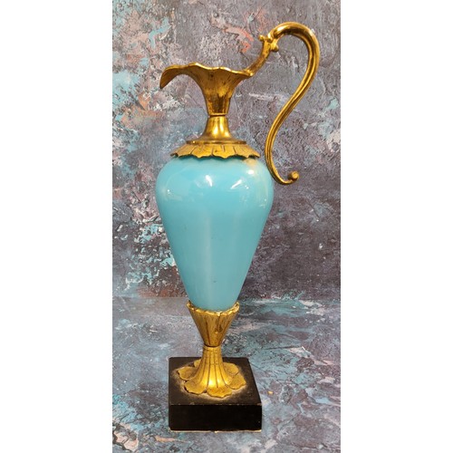 517 - A French gilt bronze mounted blue glass ewer, black square base, 21cm high