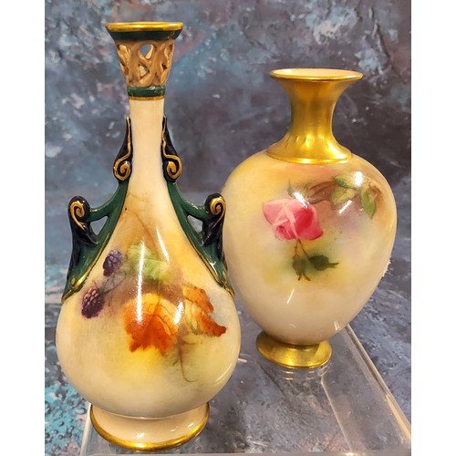 310 - A Royal Worcester Hadley bottle vase, painted with red and pink roses, gilt flared neck, 10cm high, ... 