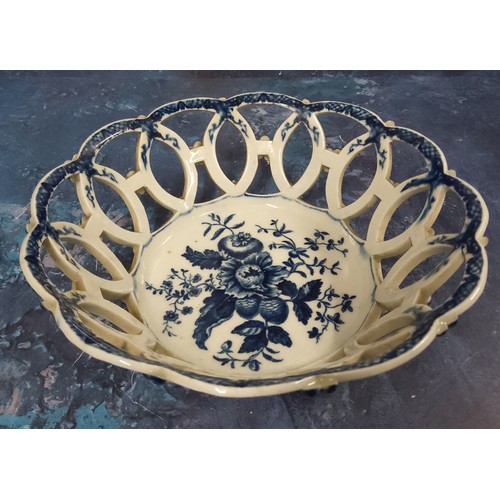 333 - A Worcester Pine Cone pattern shaped circular basket, printed in underglaze blue with peony between ... 