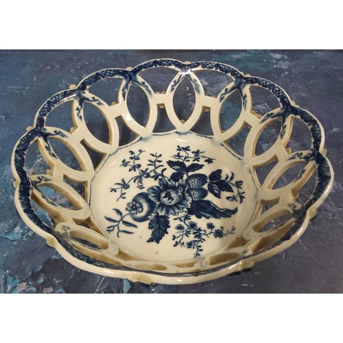 333 - A Worcester Pine Cone pattern shaped circular basket, printed in underglaze blue with peony between ... 