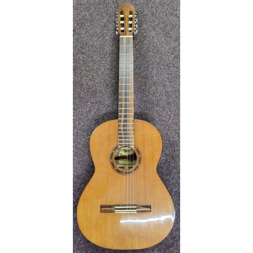 552 - A  flamenco guitar, the label printed Benito Huipe Constructor of Guitarras, the back 52cm long, 101... 