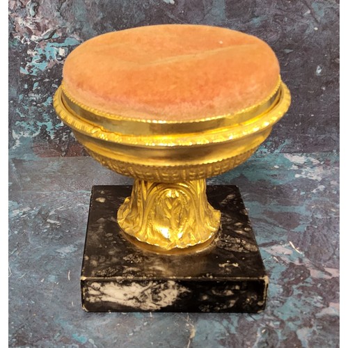 445 - A '19th century' gilt metal and marble pin cushion, as an urn, square marble base, 9.5cm high