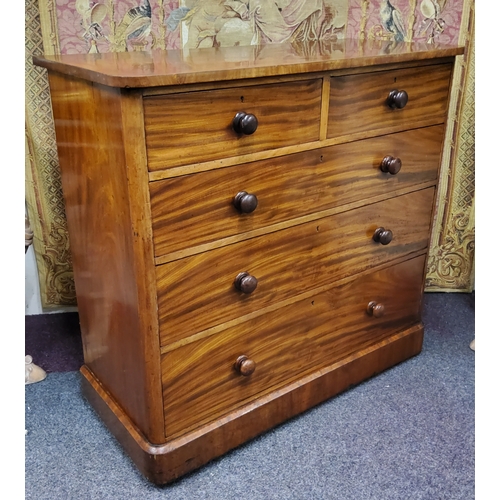 765 - A Victorian fiddle back mahogany chest of two over three graduated drawers, plinth base