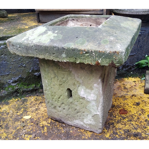 778 - A Derbyshire gritstone garden planter plinth, the top a carved gatepost finial, the solid base, dres... 