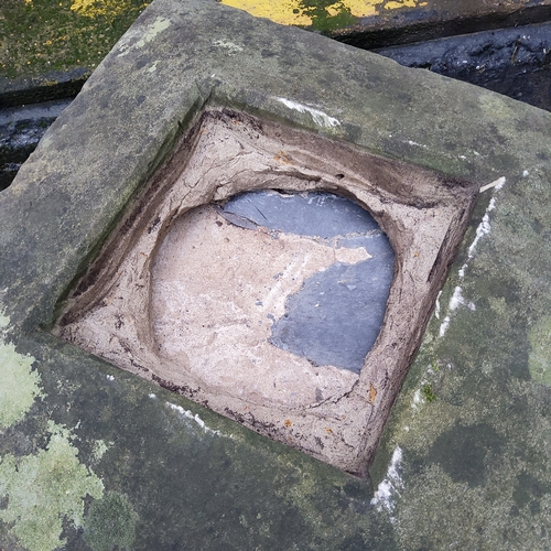 778 - A Derbyshire gritstone garden planter plinth, the top a carved gatepost finial, the solid base, dres... 