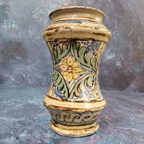 282A - A South European maiolica albarello drug jar, of waisted form, decorated in yellow and blue and... 