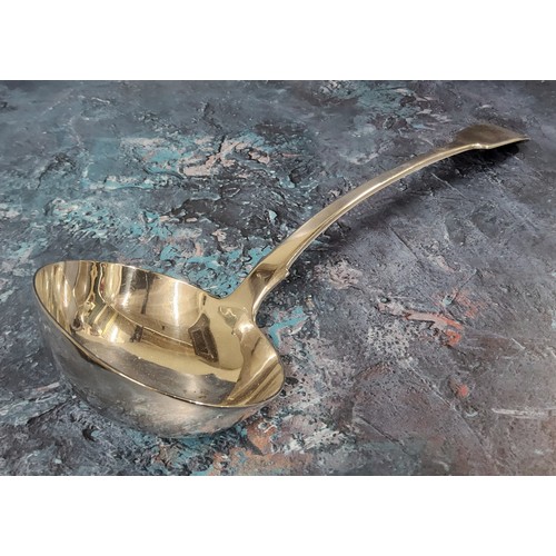 49A - A George IV silver fiddle back ladle, dragon crest, Clement Cheese, London, 1829, 34cms 209g