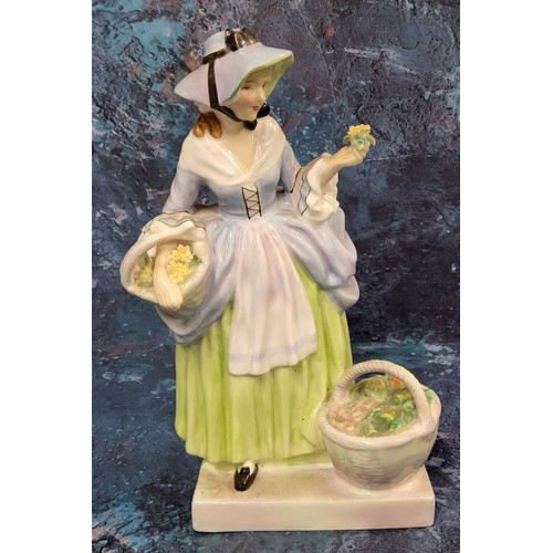 9 - A Royal Doulton figure, Spring Flowers, 18cm high, HN1807