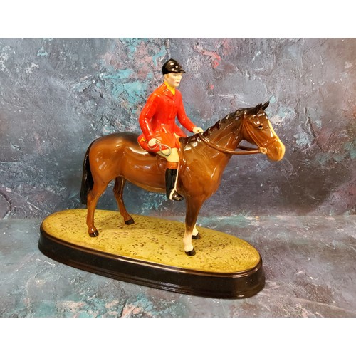 12 - A Beswick Huntsman on a Bay mare, oval base, impressed mark