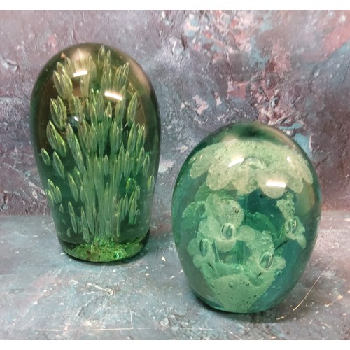 36 - A Victorian green glass dump, sulphur flower inclusion9.5cm high, c.1880;  another, bubble incl... 