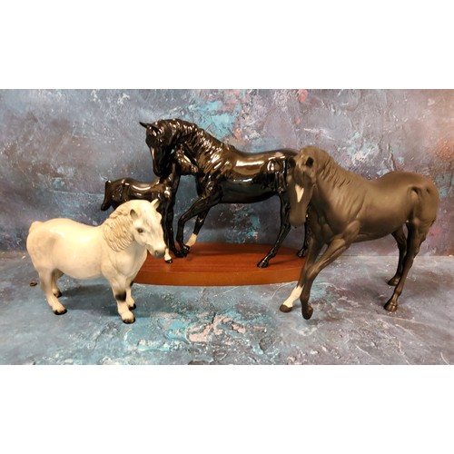 47 - A Royal Doulton model, Black Beauty and Foal,  on wooden plinth;  another, Midnight;&... 