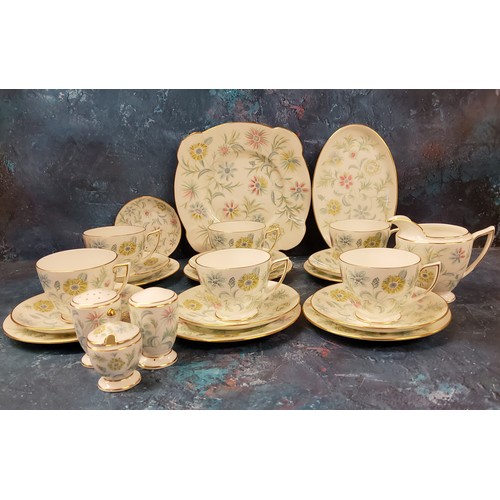 55 - A Mintons Vanessa pattern tea service, for six, printed mark;  a three-piece condiment set