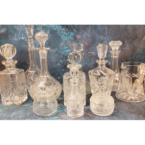 67 - Cut glass decanters, ships, bottle, canted square and others;   cut glass water jug; ... 