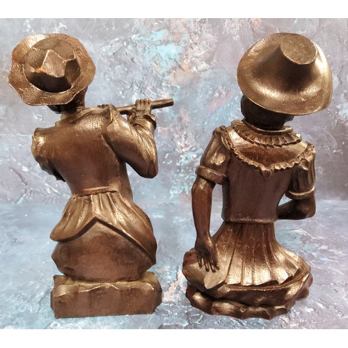 84 - A pair of 19th century German hardwood carvings, of a musician and dancer, half length, 19.5cm high,... 