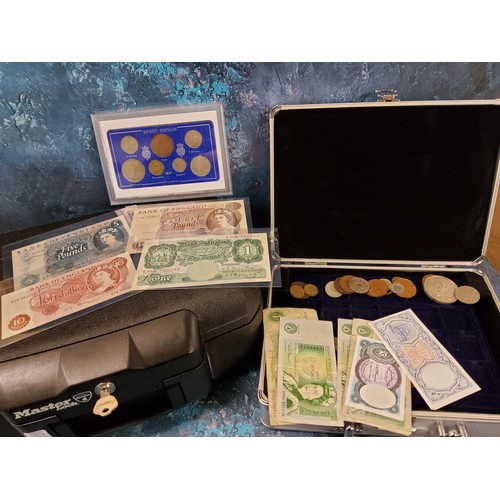 346 - Numismatics - A Master Lock safe box, with key; a coin collector's carrying case holding mixed world... 