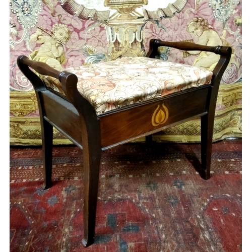 893 - An Arts & Crafts mahogany piano stool, William Morris type upholstery. c.1915