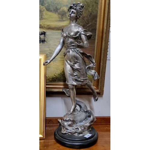 906 - Henryk Kossowski (French, 1855-1921) silvered hollow cast  figure, of a maiden, standing on a stylis... 