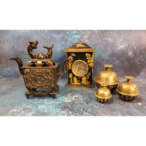 12 - A modern Chinese bronze two handled koro and cover;  three graduated bells;  a 'Chinese' b... 