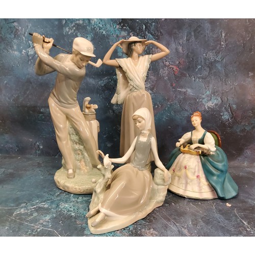 13 - A Lladro figure, of a Golfer, 27cm high;  others;  a Royal Doulton figure, Hurdy Gurdy, HN... 