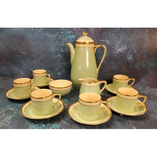 14 - An Art Deco Gray's Pottery 'Sunbuff' coffee set,  for six decorated with green, banded in cream... 