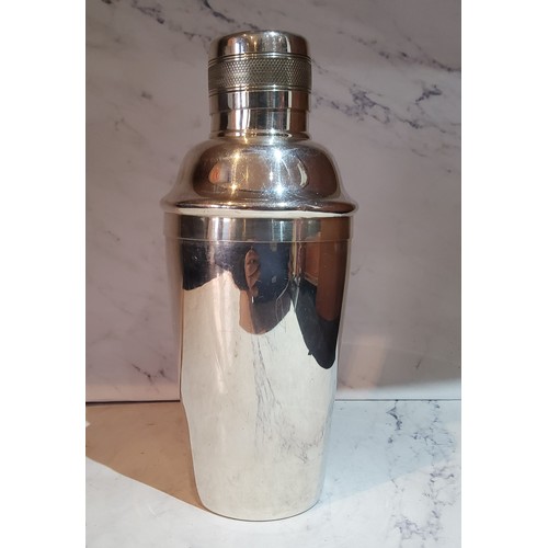 22 - An Elkington and Co tapering cylindrical cocktail shaker, 21cm high