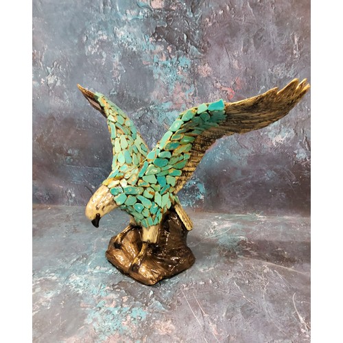 49 - A Duncan Enterprises Company ceramic eagle, perched with wings outstretched, applied with turquoise ... 