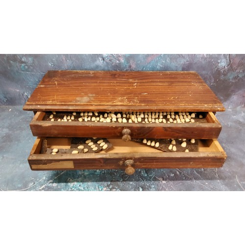 67 - Dentistry Interest - various enamelled and porcelain teeth, in an oak case, (lacking one drawer)