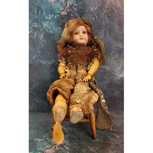 84 - A Friederike Welsch Bisque head doll, model 201, weighted blue eyes, open mouth, jointed composition... 